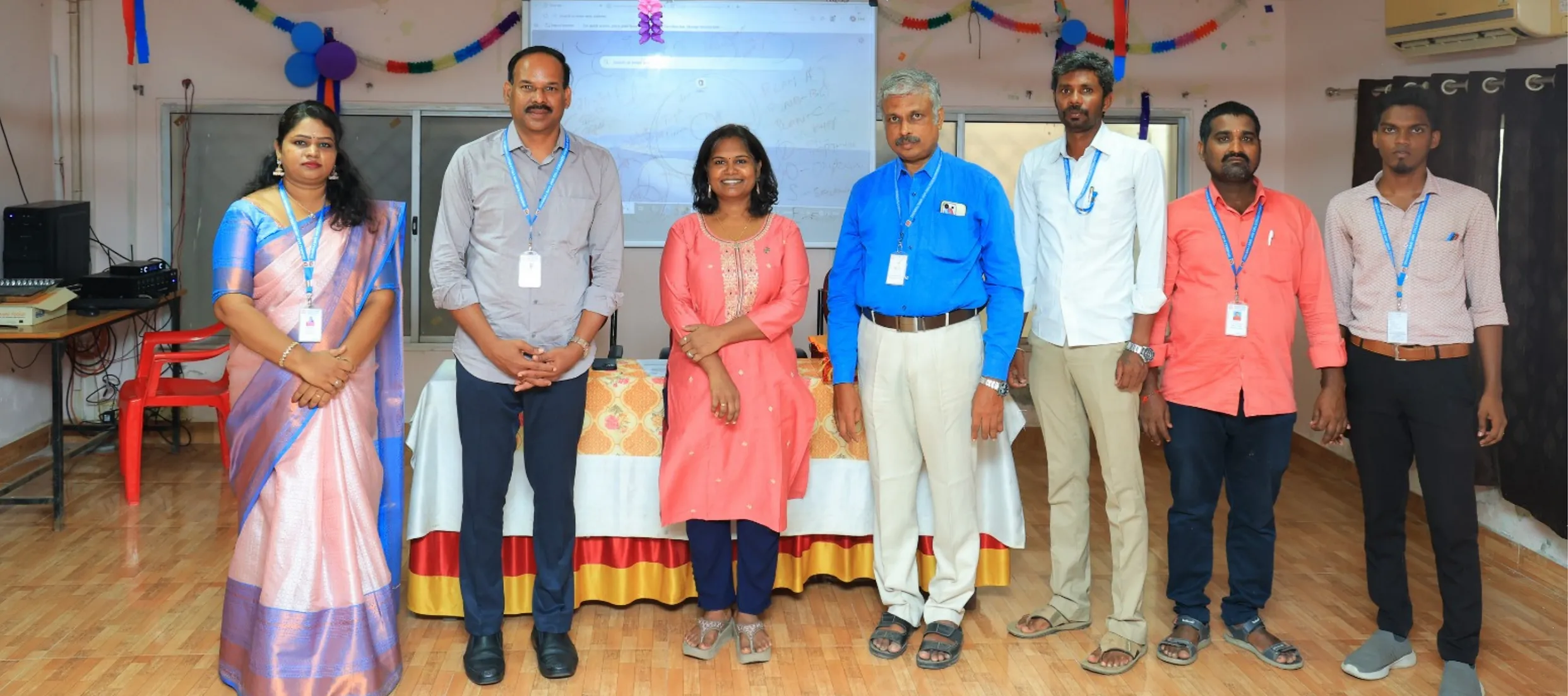 Staff and guests at a campus celebration