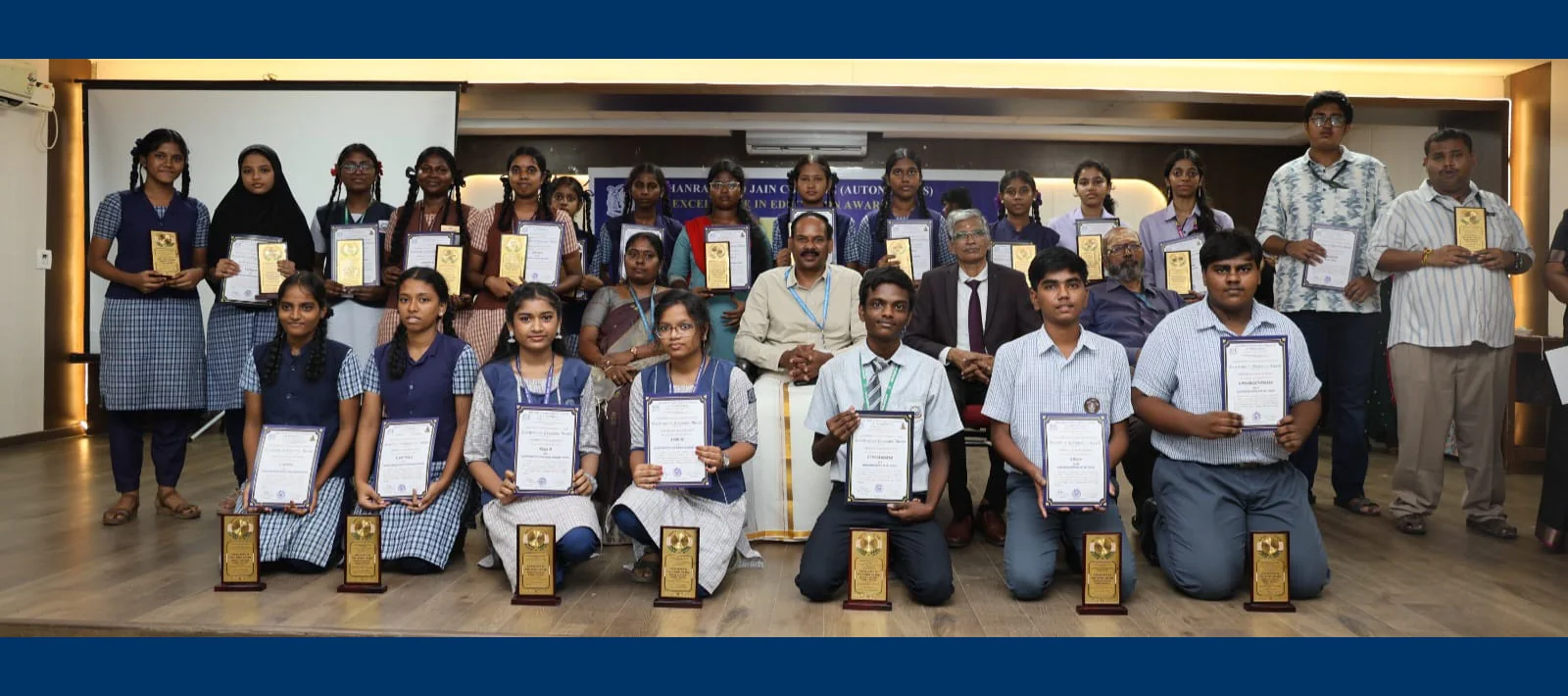 Students receiving Excellence in Education Awards 2026