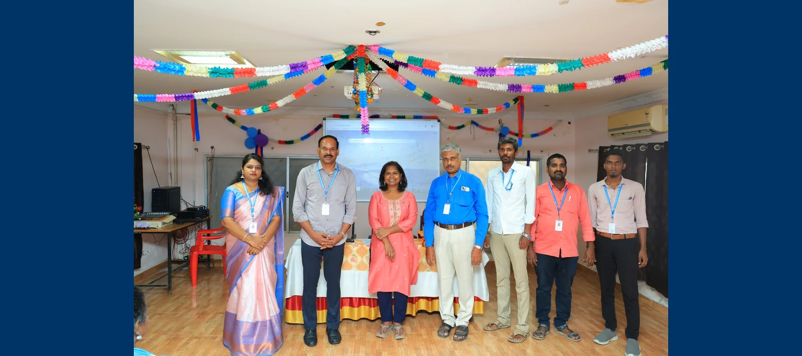 Staff and guests at a campus celebration
